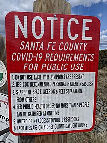 Trailhead sign in Santa Fe County Santa fe county covid sign.jpg