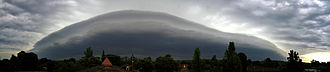 Panorama of a strong shelf cloud, which can precede the onset of high winds Thunderstorm panorama.jpg