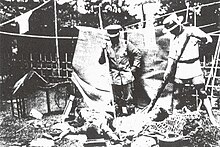 Koreans in Japan about to be stabbed by Japanese vigilantes with bamboo spears immediately after the Kanto earthquake.