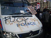 A vandalised police vehicle on Whitehall 24 Nov protests Trafalgar police van.jpg