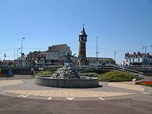 Skegness town centre, showing the clock tower and the "Jolly Fisherman" sculpture/fountain Clock Tower, Skegness 1.JPG
