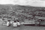 Massive housing complex on the outskirts of Seoul built by residents evicted during slum clearance. The site had no running water, sewage, or electricity. (July 5, 1971)