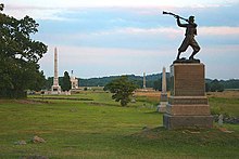 Cemetery Ridge, looking south along the ridge with Little Round Top and Big Round Top in the distance. The monument in the foreground is the 72nd Pennsylvania Infantry Monument. High Water Mark - Cemetery Ridge, Gettysburg Battlefield.jpg