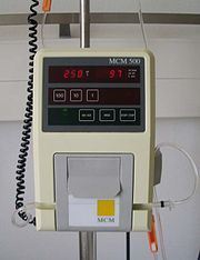 Photograph of a simple, single infusion IV pump.
