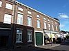 Huis met de trappen, woon/winkelhuis met brouwerijvleugel