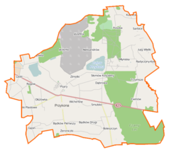 Mapa konturowa gminy Przykona, na dole nieco na lewo znajduje się punkt z opisem „Bądków Pierwszy”