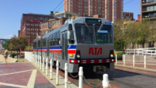 Light rail vehicle on the Waterfront Line RTA Green Line train.png