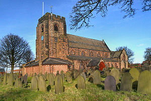A church with a battlemented west tower