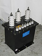 Bushings on small ferroresonant transformer