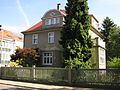 Villa mit Einfriedung