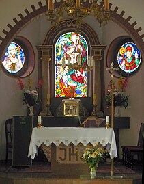 View of the three donated stained glasses window from 1924