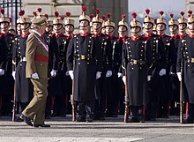Juan Carlos I reviewing the Spanish Royal Guard in 2009. El rey Juan Carlos I en la Pascua Militar de 2009.jpg