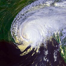 Satellite image of hurricane over the Southern United States. The storm has no eye and obscures most of Mississippi and Alabama. Louisiana can be seen on the left and Florida on the right.