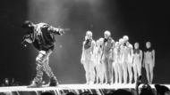A masked Kanye West performing "I Am a God" at Barclays Center on December 14, 2013, in Brooklyn, New York on The Yeezus Tour.