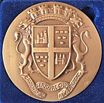 Avers de la médaille d'honneur de la ville de Bram.