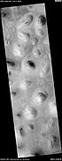 HiRISE image of Scandia Colles. Note the "basketball" texture caused by mantle of dust over surface.