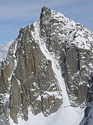 El lado oeste: en el centro el Couloir Gervasutti, escalado por primera vez por Giusto Gervasutti y Renato Chabod en julio de 1934