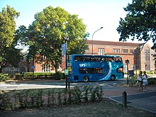 A Unilink double-decker bus passing through Highfield Campus Unilink Enviro 400 through Highfield campus.JPG