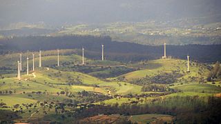 Image showing a bird's-eye view of the twelve wind turbines of the wind farm.