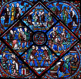 13th century window from Chartres Cathedral. Cobalt blue and borders of red flashed glass