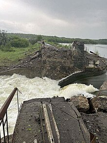 The Karlivka Reservoir dam after Russian shelling, 25 May 2023 Dam of Karlivka Reservoir after Russian shelling, 2023-05-25.jpg