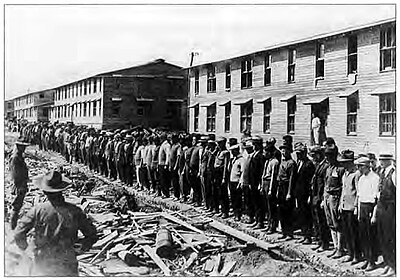 Draftees drill in civilian clothes, Camp Upton, New York.