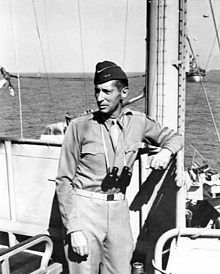 Lieutenant General Mark Clark on board USS Ancon during the landings at Salerno, Italy, 12 September 1943. Mark w clark 1943.jpg