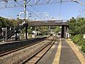 A view of the platforms and tracks. The siding can be seen to the far left.