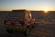 A Fiat Panda 4×4 is awaiting the morning start at one of the Mauritanian camps of the rally.