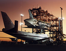Atlantis being prepared to be mated to the Shuttle Carrier Aircraft using the Mate-Demate Device following STS-44. Shuttle mate demate facility.jpg