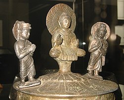 The Buddha venerated by Indra and Brahma, Kanishka casket, dated to 127 CE, British Museum.