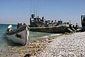 Image:USN patrol vessel and captures at Haditha Dam.jpg