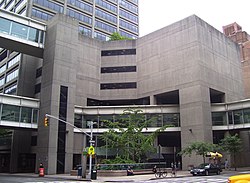 The West (seen here in the background) and East Buildings were constructed in 1981-86 - following a delay due to the 1975 New York City fiscal crisis - and were designed in the Modernist style by Ulrich Franzen & Associates; skyways connect all the buildings West Building Hunter College CUNY.jpg