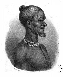 Portrait de Badu Bonsu II lors de sa capture, avant sa pendaison, avec des chaînes autour du cou.