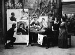 Repin lêst berjocht fan Tolstojs dea. Dêr ek: Tsjoekovski en Repin syn frou. 1910