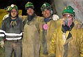 Chilean miners wearing PPE.