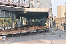 The Culver Line leaves Coney Island-Stillwell Avenue underneath the BMT Brighton Line Coney Island-Stillwell Avenue double-decker.jpg