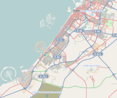 Mapa konturowa Dubaju, blisko centrum na lewo znajduje się punkt z opisem „Ocean Heights 2”