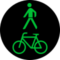 Grünes gemeinsames Fußgänger- und Radverkehrsinnbild