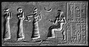 Ur-Nammu (seated) bestows governorship on Ḫašḫamer, ensi of Iškun-Sin (cylinder seal impression, ca. 2100 BCE).