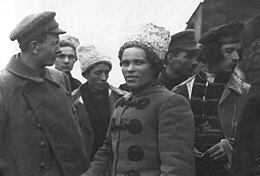 Commanders of the Revolutionary Insurgent Army of Ukraine, including Semen Karetnyk (3rd from the left), Nestor Makhno (center), and Fedir Shchus (1st from the right) Makhno group.jpg