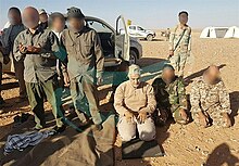 Soleimani praying in the Syrian desert in 2017 Qasem Soleimani in Syrian Desert (June 2017).jpg