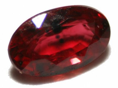 Ruby is the color of a cut and polished ruby gemstone.