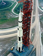 A Saturn V carrying Apollo 15 rolls out to Pad 39A in 1971 on Mobile Launch Platform 1. Saturn V aerial.jpg