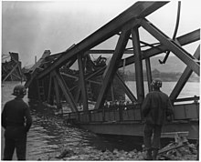 Medics wait for casualties after the collapse of the Ludendorff Bridge into the Rhine on 17 March 1945. WWII, Europe, Germany, "U.S. First Army at Remagen Bridge" - NARA - 195343.jpg