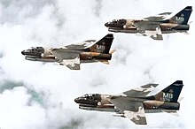 A-7D-7-CV Corsair IIs 70-0976, 70-0989 and 70-0970 of the 354th Tactical Fighter Wing in the skies over Southeast Asia. '976 and '989 were retired to AMARC in 1992, '970 is on permanent display at the National Museum of the United States Air Force, Wright-Patterson AFB, Ohio. 355th Tactical Fighter Squadron A-7D Corsair IIs in formation.jpg
