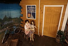 A World War II American home front diorama, depicting a woman and her daughter, at the Audie Murphy American Cotton Museum Audie Murphy American Cotton Museum July 2015 44 (World War II American home front diorama).jpg