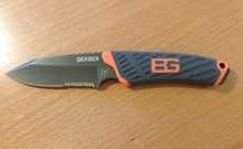 A Gerber-made full-tang survival knife. The metal from the blade extends into the handle. Fixed Blade Full Tang Survival Knife.png