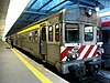 A diesel railcar built by Sorefame being loaded at Oporto Campanhã station in 2006