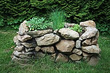 Raised garden bed with natural stones Hochbeet aus Naturstein.jpg